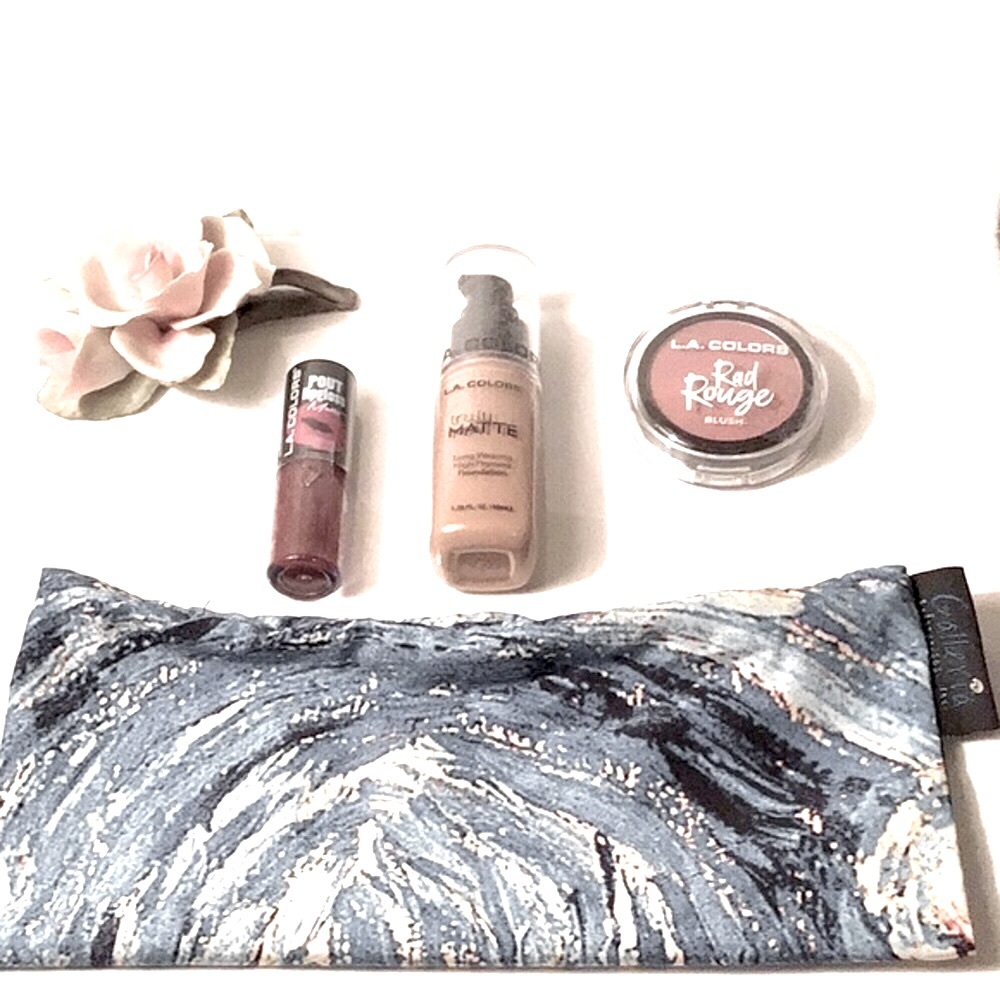 Set of 4 Lipstick,Foundation,Blush,& Makeup bag.